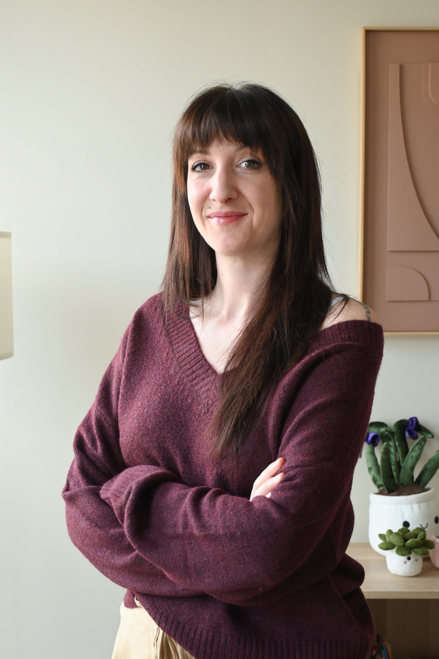 Breathtaking view of sunlit mountains and lush forest under a blue sky in Spain.